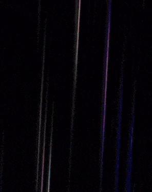 a bullet is flying through a dark room with a blurred background