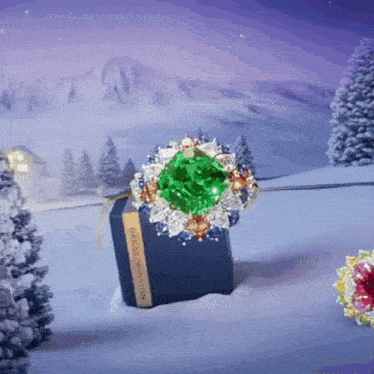 a harry winston ring with a large green stone