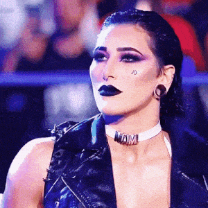 a woman wearing a choker with the name mami on it