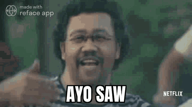a man with glasses is making a funny face and says ayo saw .