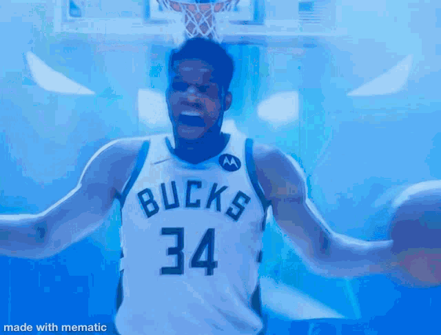 a basketball player wearing a bucks jersey with the number 34 on it