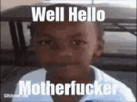 a young boy is sitting in the back seat of a car with a meme on his face .