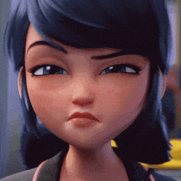 a close up of a cartoon girl 's face with a serious look on her face