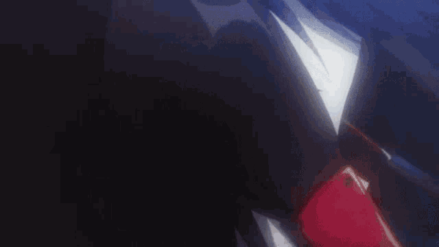 a close up of a girl 's face with a red eye