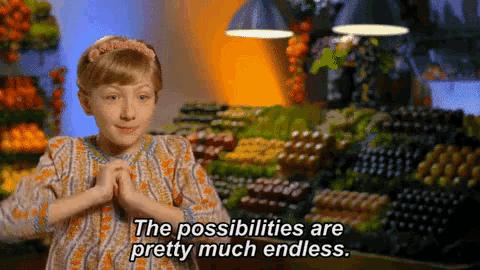 a girl says the possibilities are pretty much endless in front of a fruit stand