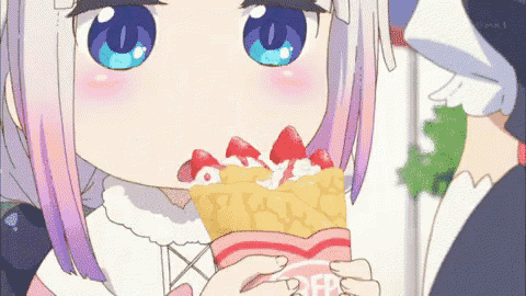 a little girl with blue eyes is eating a crepe with strawberries on it .