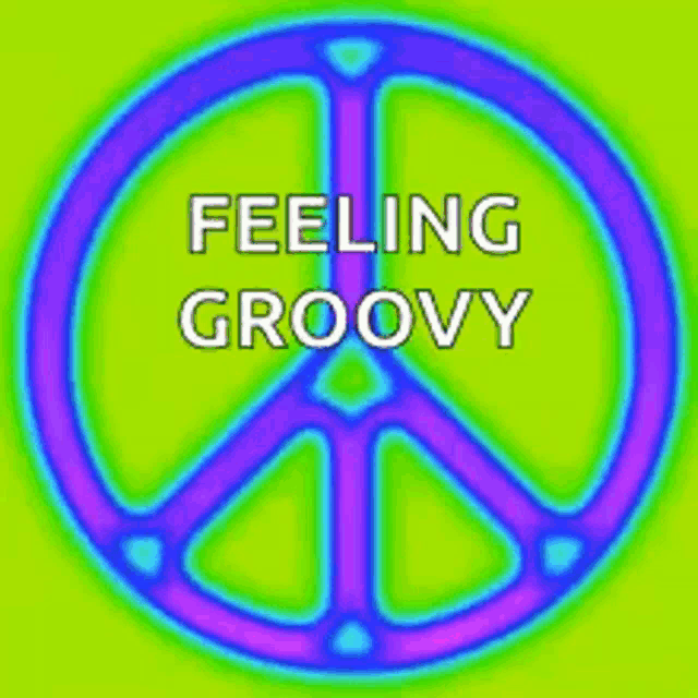 a peace sign with the words feeling groovy written below it