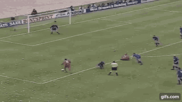 a soccer game is being played in front of a banner for bonusprint