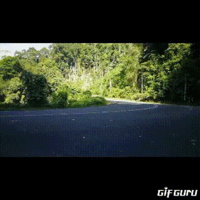 a gif of a car driving down a road