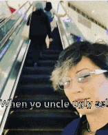 a woman wearing glasses is riding an escalator with a caption that says when yo uncle ugly asks