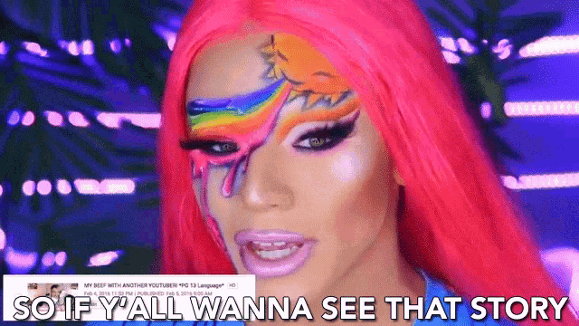 a woman with pink hair has a rainbow on her face and says so if yall wanna see that story