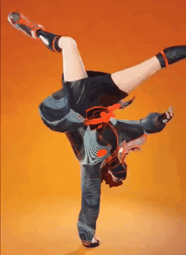 a person is doing a handstand in front of a yellow background