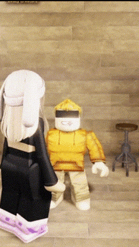 a cartoon character wearing a yellow hoodie is standing next to a girl