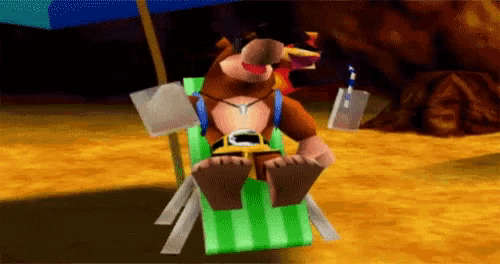 a video game character is sitting in a chair on the beach