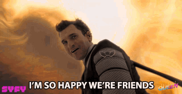 a man says i 'm so happy we 're friends in front of a fire background