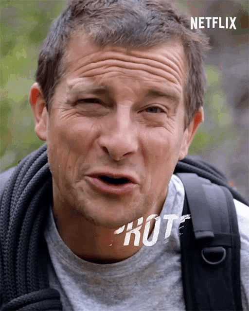 a close up of a man 's face with the word netflix on the bottom right