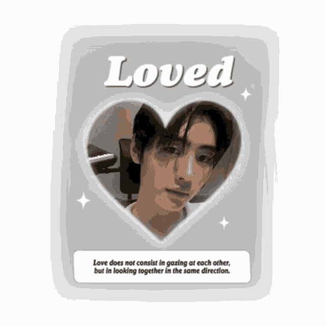 a picture of a man in a heart with the words " loved " above it