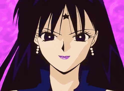 a close up of a girl 's face with a star on her forehead and earrings