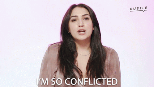 Im So Conflicted Bustle GIF - Im So Conflicted Bustle Confused GIFs