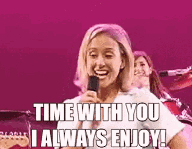 a woman is singing into a microphone with the words `` time with you i always enjoy '' .