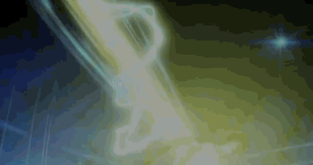 a blue and yellow background with a light coming out of the bottom