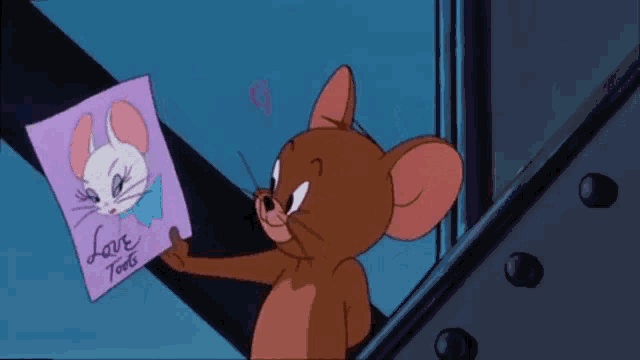jerry from tom and jerry is holding up a picture of a cat with the words love toots written on it
