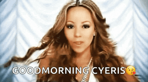 a woman says good morning cyeris with a kissing face