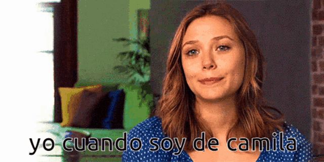 a woman says yo cuando soy de camila in a blue shirt