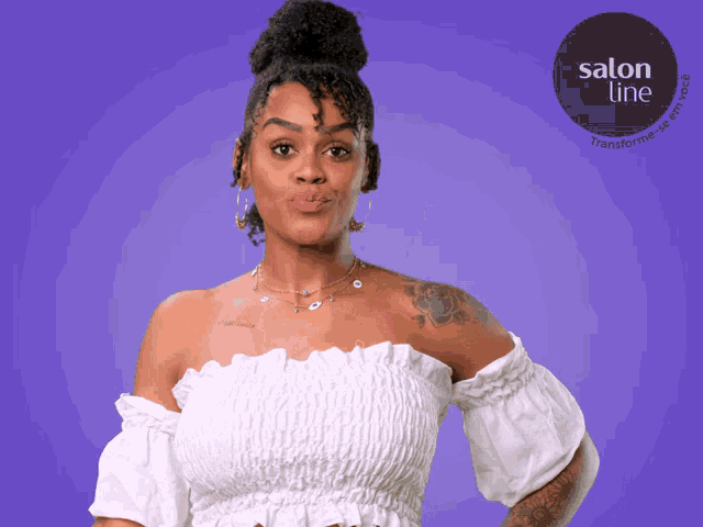 a woman in a white off the shoulder top is standing in front of a purple background with a salon line logo