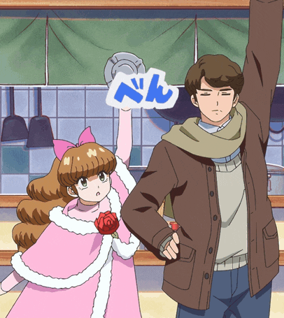 a man and a girl are standing next to each other and the girl is holding a sign that says ' nn '