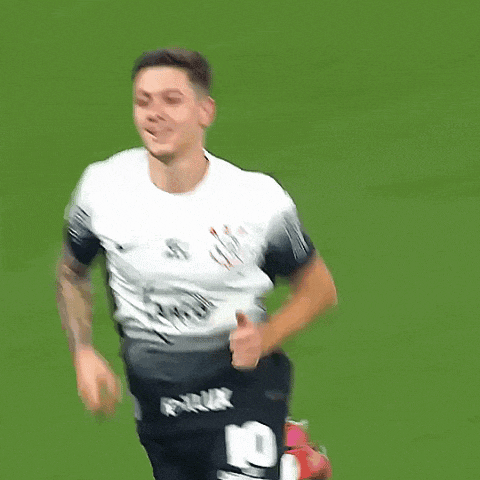 a soccer player wearing number 10 runs on the field
