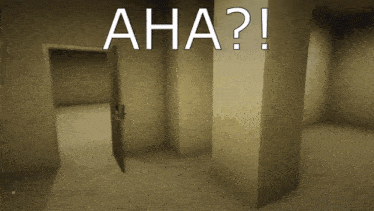 an empty room with a door and the words aha written on the wall