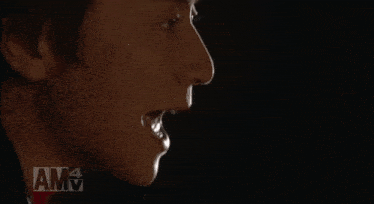 a close up of a person 's face with amv written on the bottom right