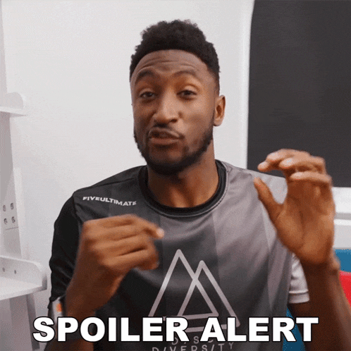 a man wearing a shirt that says fiveultimate says spoiler alert