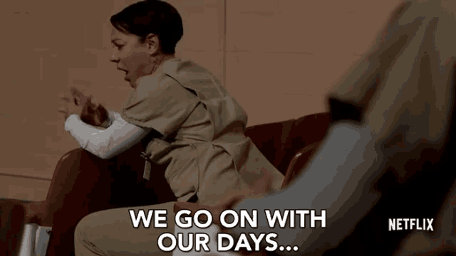 a netflix ad shows a woman sitting in a chair with the words we go on with our days