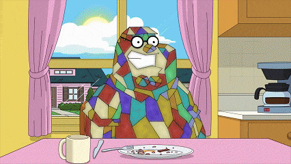 a cartoon character sits at a table with a plate of food and a cup of coffee