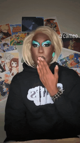 a person wearing a black hoodie that says animal crossing