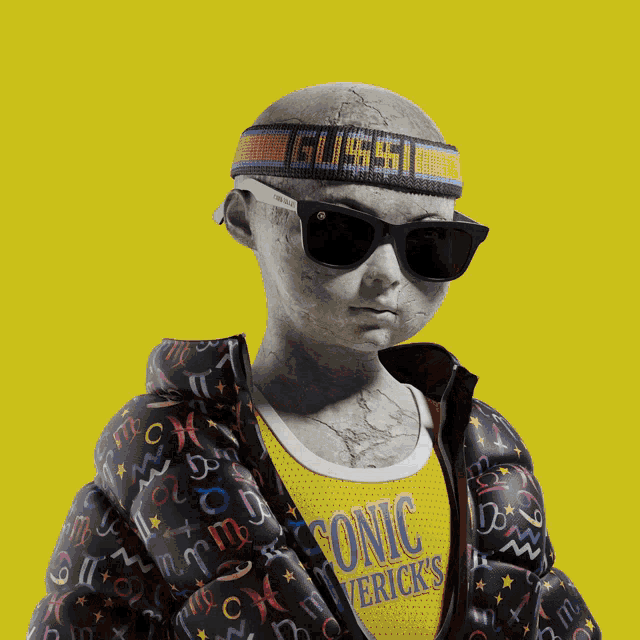 a man wearing a beanie and goggles has a picture of pablo escobar on his sweatshirt