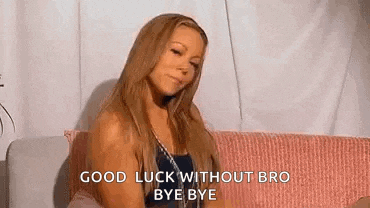 a woman is sitting on a couch with her eyes closed and saying good luck without bro bye bye .