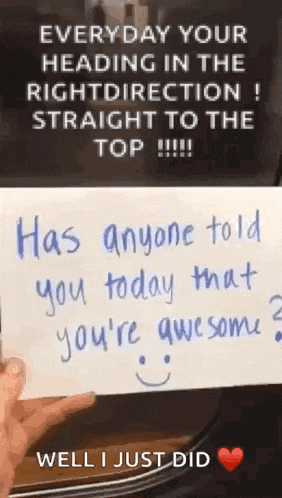 a person is holding a sign that says `` everyday your heading in the right direction straight to the top ! ''