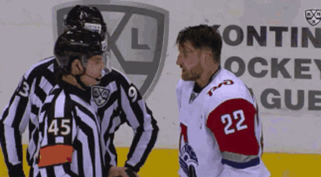 a hockey player with the number 22 on the back of his jersey