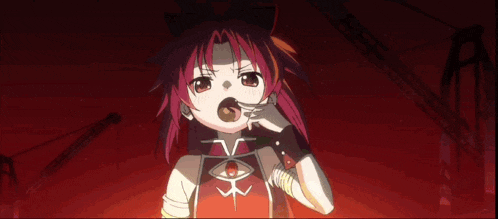 a girl with red hair is holding a piece of food in her mouth