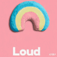 a pink heart with the word proud on it