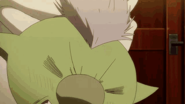 a close up of a cartoon character 's head and neck