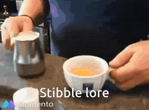 a person is pouring milk into a cup of coffee and the words stibble lore are on the bottom