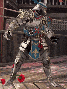 a knight in armor is holding a red flower