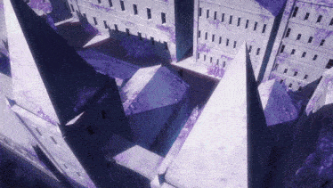 an aerial view of a building with purple triangles