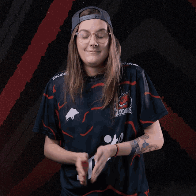 a woman wearing a jersey that says ' spike ' on the front
