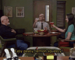 a group of people sitting at a table with the words easy peasy lemon squeezy written on the bottom