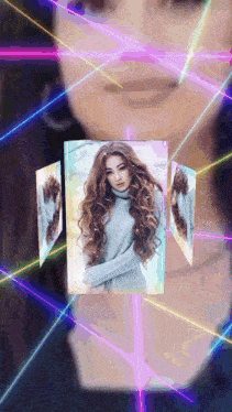 a woman with long curly hair is surrounded by glowing lights